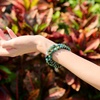 image:imageBivei Natural Crystals Gemstone Healing Stretchy Round Beaded Bracelet  8MM Semi Precious Beads Bracelet Handmade Spiritual Jewelry Gift for Women MenEnhance Positive Energy8mm Moss Agate  African Turquoise Peace  Prosperity