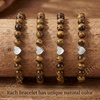 image:imageBivei Crystal Stretch 6mm Bracelets for Women  Handmade Natural Stone Beaded Stretch Bracelet Stainless Steel Heart Bead Tranquility Yoga Gift Jewelry for WomenTiger Eye  Empowering